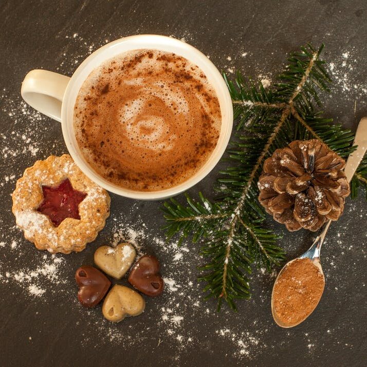 Christmas cookies and truffles with a cup of coffee